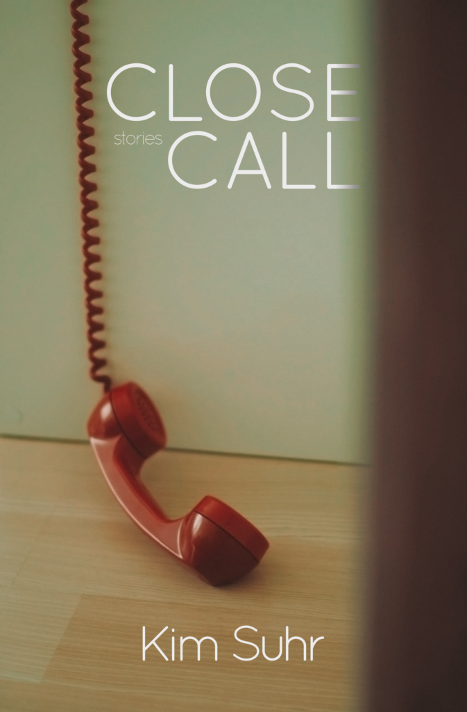 The cover of Close Call by Kim Suhr. A red corded phone dangles on a hardwood floor.